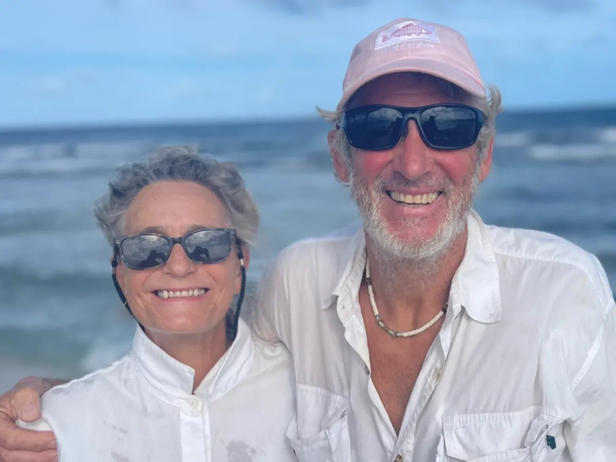 Justin and Sue sailing together